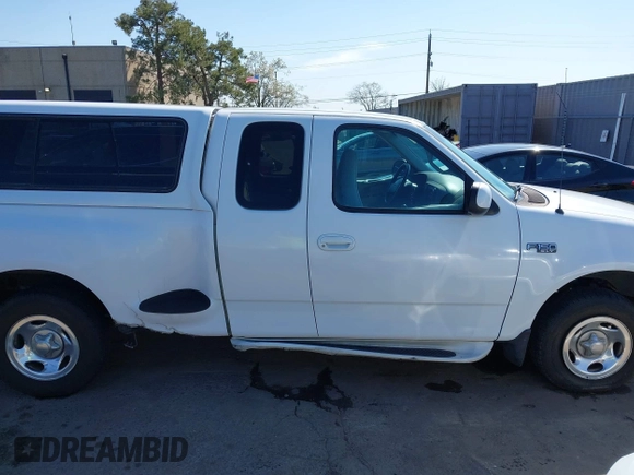 1998 Ford F-150 XL with VIN 1FTZX072XWKA12003, listed as a IAAI auction lot 41765328 with 119,445 mi miles and . Bid and sale history available at DreamBid. Image 13.