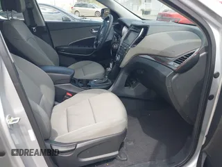 2017 Hyundai Santa Fe 2.4L z VIN 5XYZUDLB6HG400828, wystawiony jako IAAI lot #42013903 z przebiegiem 88 573 mil mil oraz . Historia ofert i sprzedaży dostępna na DreamBid. Obrazek 5.