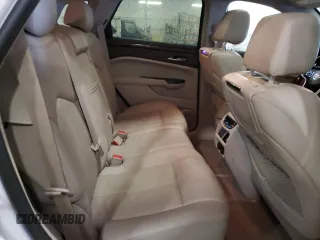 2014 Cadillac SRX Premium Collection z VIN 3GYFNGE36ES581361, wystawiony jako Copart lot #88540815 z przebiegiem 137 047 mil mil oraz Nie do naprawy. Historia ofert i sprzedaży dostępna na DreamBid. Obrazek 11.