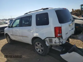 2010 Honda Pilot Touring with VIN 5FNYF3H82AB022596, listed as a Copart auction lot 71893214 with 131,901 mi miles and Salvage Title. Bid and sale history available at DreamBid. Image 2.
