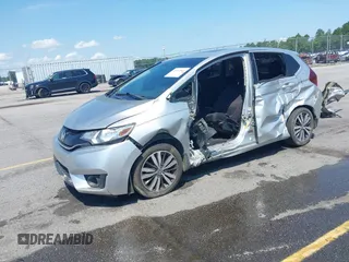 2015 Honda Fit EX-L z VIN 3HGGK5H82FM727678, wystawiony jako IAAI lot #42451860 z przebiegiem 102 512 mil mil oraz . Historia ofert i sprzedaży dostępna na DreamBid. Obrazek 17.