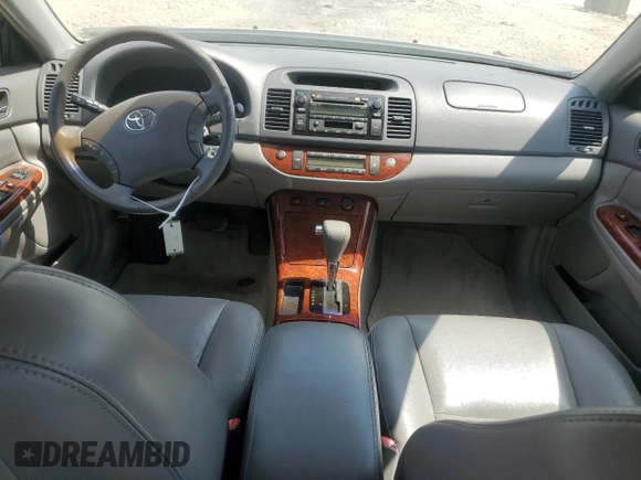 2005 Toyota Camry LE with VIN 4T1BF32K85U614653, listed as a Copart auction lot 52860195 with 156,675 mi miles and Salvage Title. Bid and sale history available at DreamBid. Image 8.