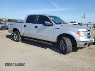 2014 Ford F-150 XL with VIN 1FTFW1EF5EKE57295, listed as a Copart auction lot 61687195 with 123,852 mi miles and Salvage title. Bid and sale history available at DreamBid. Image 4.