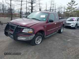 1998 Ford F-150 XL with VIN 1FTDX18W9WKA01690, listed as a IAAI auction lot 41944734 with 176,359 mi miles. Bid and sale history available at carsss.com. Image 2.
