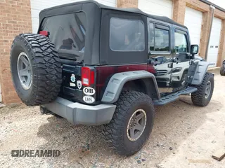 2015 Jeep Wrangler Unlimited Rubicon с VIN 1C4BJWFG4FL566862, выставлен на аукционе IAAI как лот 42310901 с пробегом 146 206 миль миль и . История ставок и продаж доступна на DreamBid. Изображение 4.
