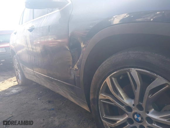 2018 BMW X2 sDrive28i with VIN WBXYJ3C36JEP75885, listed as a IAAI auction lot 41503551 with 136,671 mi miles. Bid and sale history available at carsss.com. Image 6.