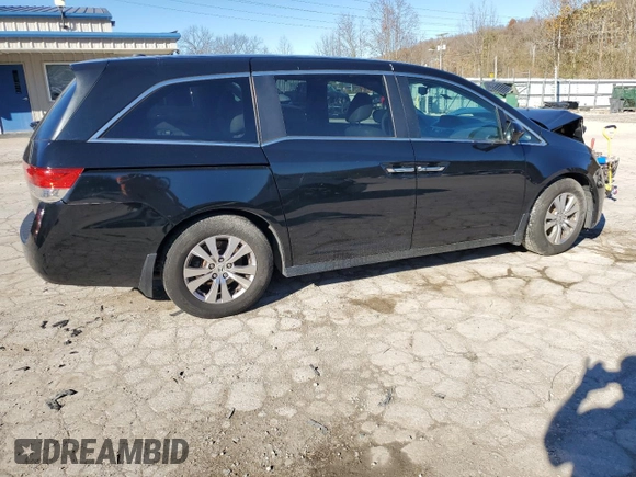 2014 Honda Odyssey EX-L with VIN 5FNRL5H69EB121140, listed as a Copart auction lot 79698724 with 169,626 mi miles and Salvage Title. Bid and sale history available at DreamBid. Image 3.
