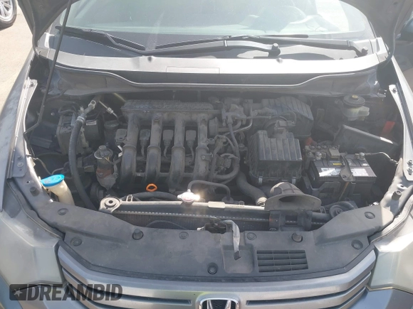 2010 Honda Insight EX with VIN JHMZE2H71AS032532, listed as a IAAI auction lot 41988221 with 333,144 mi miles and . Bid and sale history available at DreamBid. Image 10.