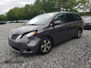 2015 Toyota Sienna LE AAS with VIN 5TDKK3DC5FS585219, listed as a Copart auction lot 57590045 with 184,693 mi miles and Clean title. Bid and sale history available at DreamBid. Image 1.