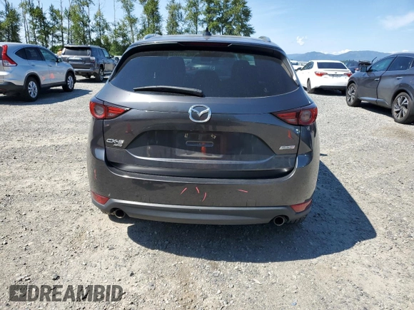 2018 Mazda CX-5 Grand Touring with VIN JM3KFBDM5J0373351, listed as a Copart auction lot 59395945 with Not provided miles and Salvage title. Bid and sale history available at DreamBid. Image 6.