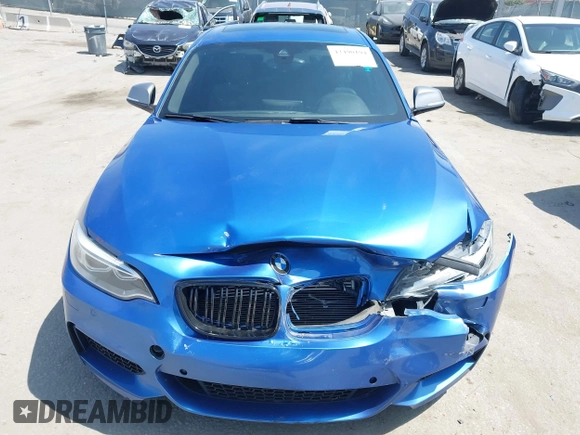 2014 BMW 2 Series M235i with VIN WBA1J7C52EVW84588, listed as a IAAI auction lot 42490194 with 103,998 mi miles and . Bid and sale history available at DreamBid. Image 12.