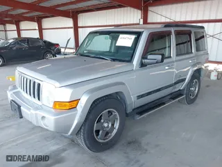 2008 Jeep Commander Sport with VIN 1J8HH48K58C143456, listed as a IAAI auction lot 41847541 with 163,209 mi miles. Bid and sale history available at carsss.com. Image 2.