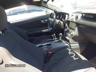 2021 Ford Mustang EcoBoost with VIN 1FA6P8TH8M5146814, listed as a IAAI auction lot 42320578 with 94,237 mi miles and . Bid and sale history available at DreamBid. Image 5.