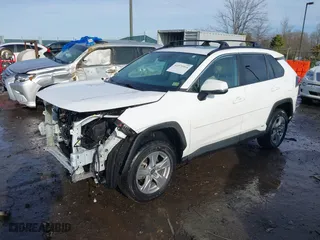 2022 Toyota RAV4 Hybrid XLE with VIN 4T3RWRFV3NU051850, listed as a IAAI auction lot 41571914 with 55,584 mi miles. Bid and sale history available at carsss.com. Image 18.