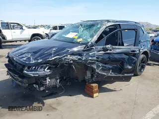 2023 Volkswagen Tiguan SE R-Line Black с VIN 3VVCB7AX9PM014564, выставлен на аукционе IAAI как лот 41993740 с пробегом Не указан миль и . История ставок и продаж доступна на DreamBid. Изображение 2.