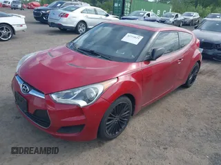 2012 Hyundai Veloster w/Black Int with VIN KMHTC6AD8CU053904, listed as a IAAI auction lot 42774621 with 164,599 mi miles and . Bid and sale history available at DreamBid. Image 2.