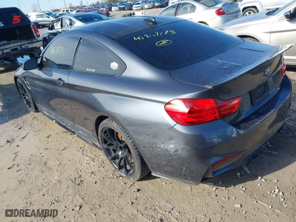 2015 BMW M4 with VIN WBS3R9C57FK334921, listed as a IAAI auction lot 41869773 with 107,058 mi miles. Bid and sale history available at carsss.com. Image 3.