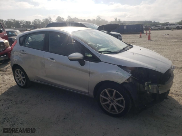 2019 Ford Fiesta SE with VIN 3FADP4EJ1KM148640, listed as a Copart auction lot 79414284 with 84,982 mi miles and Salvage Title. Bid and sale history available at carsss.com. Image 4.