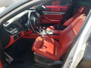 2013 BMW X6 M with VIN 5YMGZ0C50D0C40144, listed as a Copart auction lot 64889554 with 91,024 mi miles and Salvage Title. Bid and sale history available at carsss.com. Image 7.