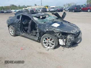 2008 Hyundai Tiburon GT z VIN KMHHN66F28U286310, wystawiony jako IAAI lot #39303200 z przebiegiem 131 651 mil mil oraz . Historia ofert i sprzedaży dostępna na DreamBid. Obrazek 1.