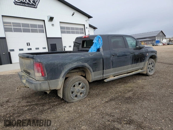 2015 Ram 3500 Laramie with VIN 3C63R3ML9FG590199, listed as a Copart auction lot 74700724 with 297,776 mi miles and Salvage Title. Bid and sale history available at carsss.com. Image 3.
