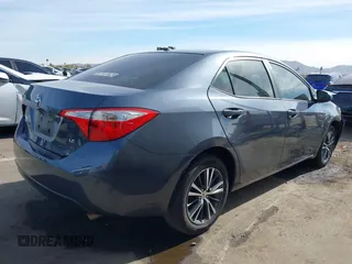 2016 Toyota Corolla L with VIN 5YFBURHE8GP561600, listed as a IAAI auction lot 41389830 with 129,897 mi miles and . Bid and sale history available at DreamBid. Image 4.