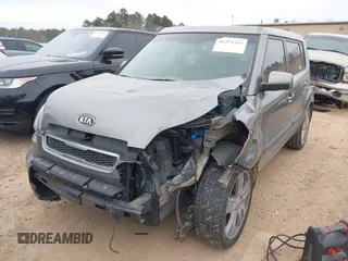 2011 Kia Soul + with VIN KNDJT2A28B7307028, listed as a IAAI auction lot 41374263 with 182,074 mi miles. Bid and sale history available at carsss.com. Image 2.
