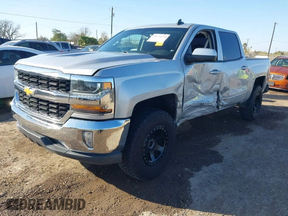 2018 Chevrolet Silverado 1500 LT with VIN 3GCPCREC9JG574686, listed as a IAAI auction lot 41676124 with 74,239 mi miles and . Bid and sale history available at DreamBid. Image 2.