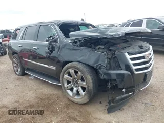 2017 Cadillac Escalade Luxury z VIN 1GYS4BKJ8HR263059, wystawiony jako IAAI lot #41861709 z przebiegiem 161 315 mil mil oraz . Historia ofert i sprzedaży dostępna na DreamBid. Obrazek 1.