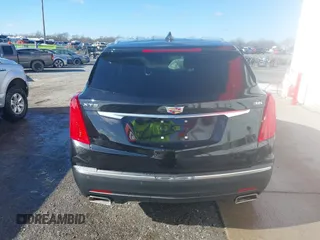 2017 Cadillac XT5 Luxury FWD with VIN 1GYKNBRS5HZ164209, listed as a IAAI auction lot 41213572 with 144,039 mi miles. Bid and sale history available at carsss.com. Image 16.