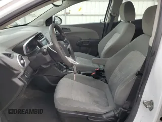 2017 Chevrolet Sonic LT with VIN 1G1JG6SH0H4144831, listed as a Copart auction lot 53252905 with 148,710 mi miles and Salvage title. Bid and sale history available at DreamBid. Image 7.