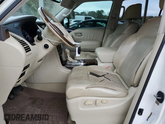 2012 Infiniti QX56 7-passenger with VIN JN8AZ2NE5C9017245, listed as a Copart auction lot 79654654 with 153,294 mi miles and Salvage Title. Bid and sale history available at carsss.com. Image 7.