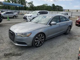 2014 Audi A6 Premium Plus with VIN WAUGFAFC2EN044271, listed as a Copart auction lot 61604885 with 195,097 mi miles and Salvage title. Bid and sale history available at DreamBid. Image 1.