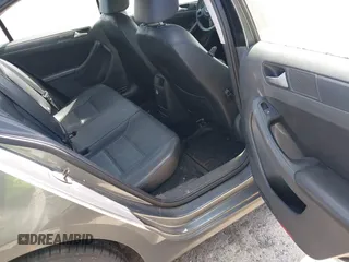 2014 Volkswagen Jetta SE z VIN 3VWD17AJ1EM238164, wystawiony jako IAAI lot #42672236 z przebiegiem 126 098 mil mil oraz . Historia ofert i sprzedaży dostępna na DreamBid. Obrazek 8.