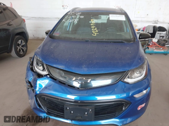 2018 Chevrolet Bolt EV Premier z VIN 1G1FX6S02J4130855, wystawiony jako IAAI lot #42249019 z przebiegiem 38 293 mil mil oraz . Historia ofert i sprzedaży dostępna na DreamBid. Obrazek 12.