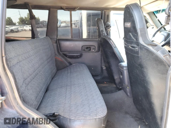 2000 Jeep Cherokee with VIN 1J4FF48S3YL126931, listed as a Copart auction lot 57593305 with Not provided miles and Non repairable. Bid and sale history available at DreamBid. Image 10.
