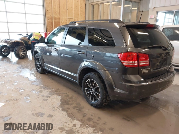 2018 Dodge Journey SE with VIN 3C4PDCAB9JT428917, listed as a IAAI auction lot 41578750 with 136,886 mi miles and . Bid and sale history available at DreamBid. Image 3.