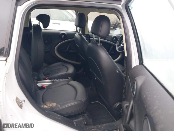 2011 MINI Cooper Countryman with VIN WMWZB3C54BWM01011, listed as a IAAI auction lot 41809669 with 1 mi miles. Bid and sale history available at carsss.com. Image 8.