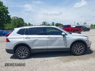 2018 Volkswagen Tiguan SEL z VIN 3VV2B7AX6JM195125, wystawiony jako IAAI lot #42523047 z przebiegiem 73 926 mil mil oraz . Historia ofert i sprzedaży dostępna na DreamBid. Obrazek 14.