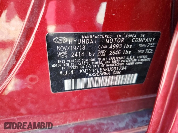 2019 Genesis G70 Advanced with VIN KMTG34LE5KU031794, listed as a Copart auction lot 56139885 with 34,873 mi miles and Salvage title. Bid and sale history available at DreamBid. Image 12.