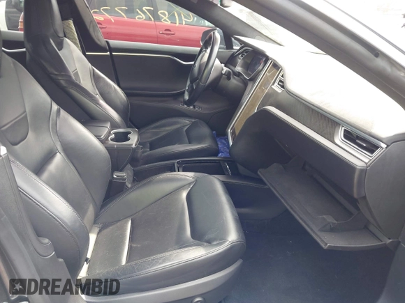 2015 Tesla Model S 85D with VIN 5YJSA1E21FF116775, listed as a IAAI auction lot 41876772 with 128,805 mi miles. Bid and sale history available at carsss.com. Image 5.