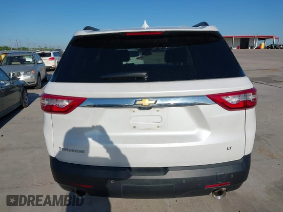 2021 Chevrolet Traverse LT z VIN 1GNERHKWXMJ163645, wystawiony jako IAAI lot #41949887 z przebiegiem 89 448 mil mil oraz . Historia ofert i sprzedaży dostępna na DreamBid. Obrazek 16.