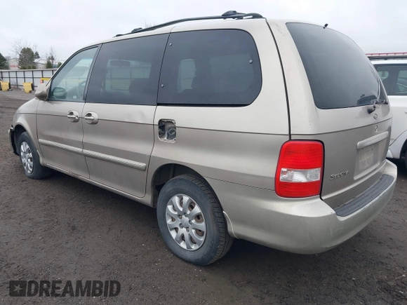 2004 Kia Sedona LX with VIN KNDUP131746563430, listed as a IAAI auction lot 41896386 with 141,526 mi miles. Bid and sale history available at carsss.com. Image 3.