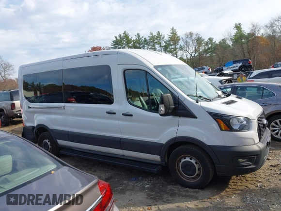 2023 Ford Transit Cargo with VIN 1FTBR1C86PKA52494, listed as a IAAI auction lot 40740671 with 9,999 mi miles and . Bid and sale history available at DreamBid. Image 13.