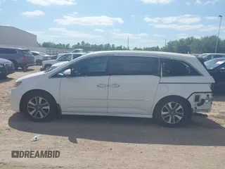 2016 Honda Odyssey Touring Elite with VIN 5FNRL5H98GB102544, listed as a IAAI auction lot 42040050 with 128,957 mi miles and . Bid and sale history available at DreamBid. Image 15.