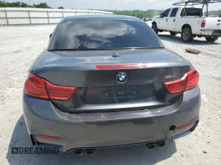 2018 BMW M4 with VIN WBS4Z9C50JED22222, listed as a Copart auction lot 57043595 with 71,899 mi miles and Salvage title. Bid and sale history available at DreamBid. Image 6.