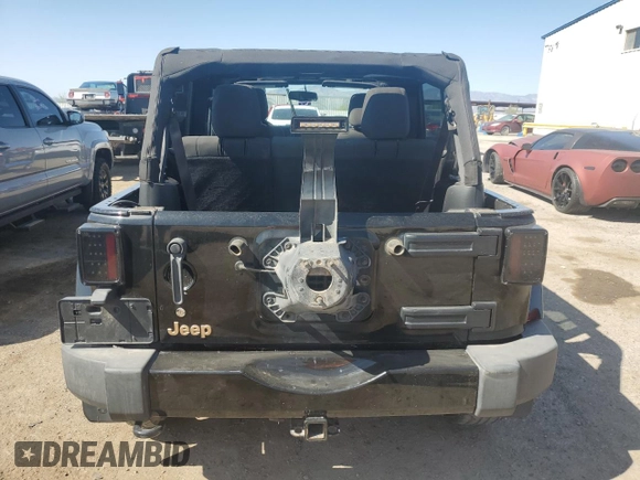 2014 Jeep Wrangler Unlimited Sahara with VIN 1C4BJWEGXEL150119, listed as a Copart auction lot 52378075 with 122,443 mi miles and Salvage Title. Bid and sale history available at carsss.com. Image 6.