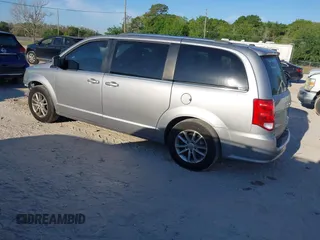 2018 Dodge Grand Caravan SXT with VIN 2C4RDGCG5JR267428, listed as a IAAI auction lot 41877661 with 103,633 mi miles and . Bid and sale history available at DreamBid. Image 3.