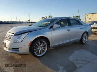 2014 Cadillac XTS Premium with VIN 2G61P5S35E9288781, listed as a Copart auction lot 41873065 with 64,936 mi miles and Salvage Title. Bid and sale history available at carsss.com. Image 1.
