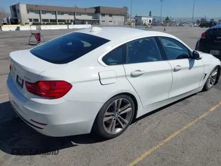 2017 BMW 4 Series 430i with VIN WBA4F7C31HG789340, listed as a IAAI auction lot 41871217 with 97,971 mi miles and . Bid and sale history available at DreamBid. Image 4.